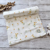 Buttercup floral muslin swaddle 100% organic cotton