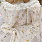 Buttercup floral muslin swaddle 100% organic cotton