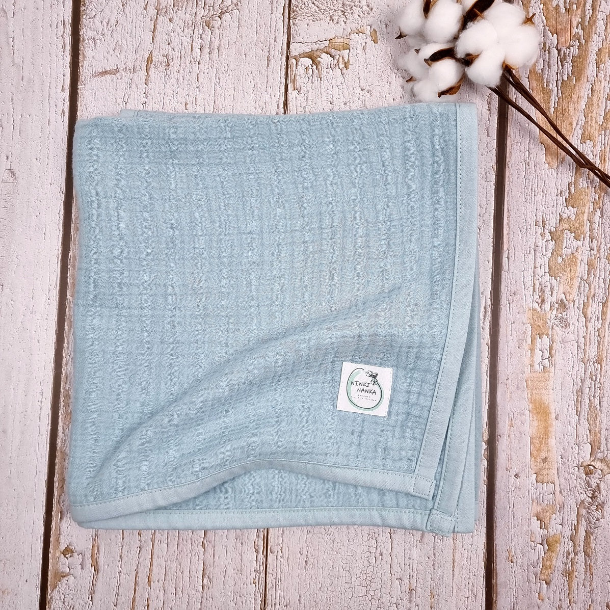Light blue organic muslin Quilt Blanket for newborns, toddler and beyond.