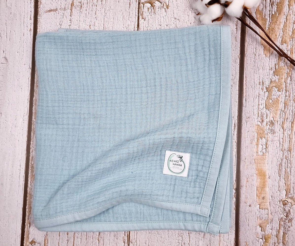 Light blue organic muslin Quilt Blanket for newborns, toddler and beyond.