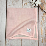 Soft pink double sided organic muslin blanket for babies and toddlers. Light pink & light grey