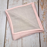 Soft pink double sided organic muslin blanket for babies and toddlers. Light pink & light grey