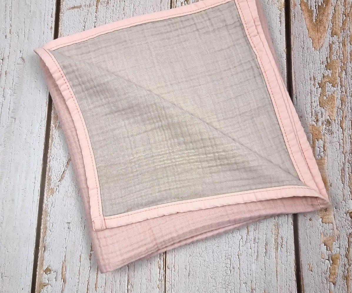 Soft pink double sided organic muslin blanket for babies and toddlers. Light pink & light grey