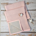 Soft pink double sided organic muslin blanket for babies and toddlers. Light pink & light grey