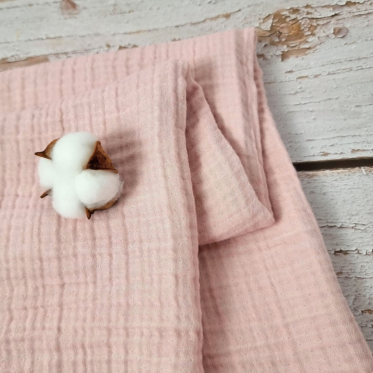 Soft pink double sided organic muslin blanket for babies and toddlers. Light pink & light grey
