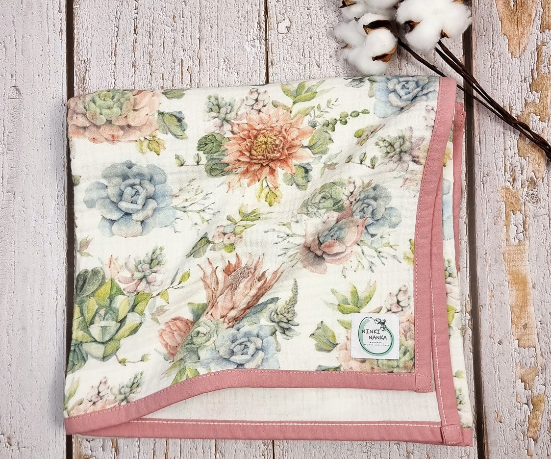 Floral printed organic muslin blanket for baby girls and toddlers.